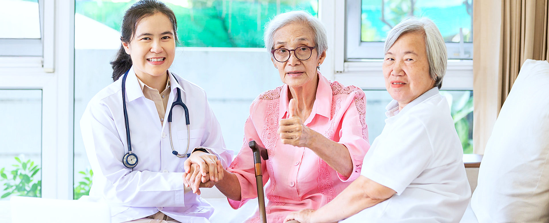 medical practitioner and two senior woman